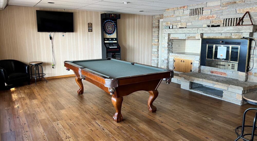 Play a few games of pool in the game room downstairs